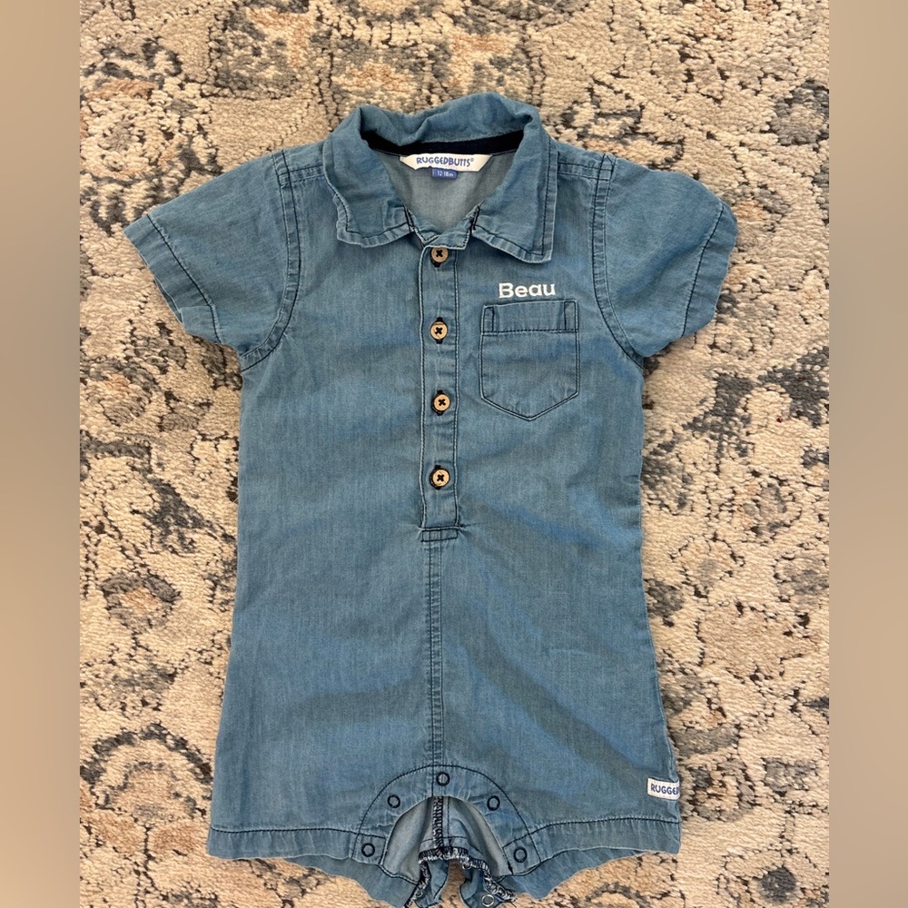 Ruffle Butts Blue Denim Monogrammed “BEAU” romper